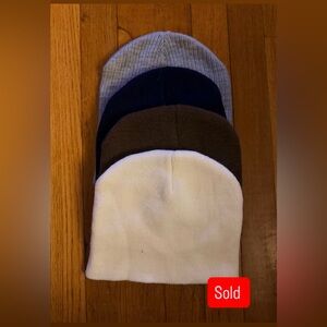 Set of Four Knit Beanies in White, Brown, Navy, and Light Gray
